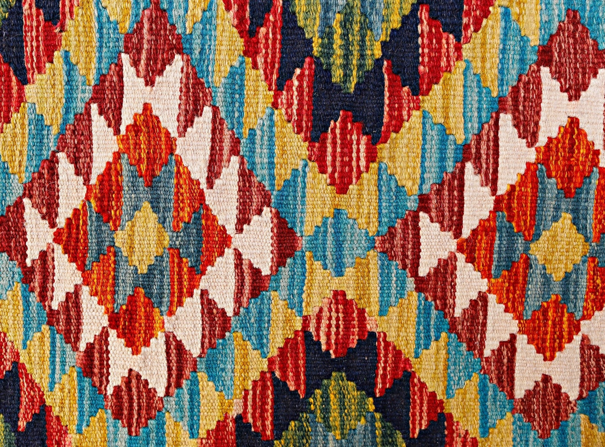 Handwoven Afghan Maimana wool kilim runner featuring a vibrant geometric diamond pattern.