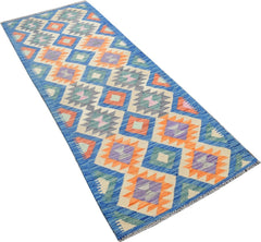 Handmade Afghan Maimana wool runner rug featuring a colorful geometric diamond pattern.