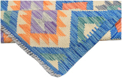 A handmade Afghan Maimana kilim runner featuring vibrant geometric patterns in blue and orange.