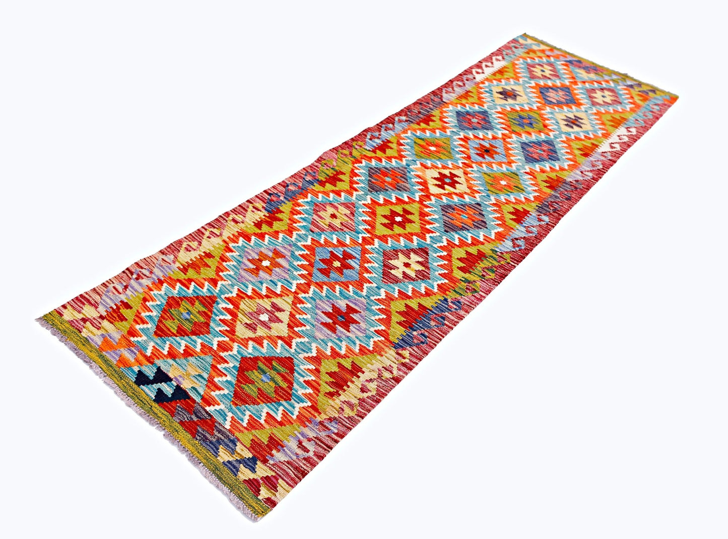 Handwoven Afghan Maimana wool runner rug featuring a colorful geometric diamond pattern.
