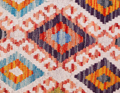 Handwoven Afghan Maimana kilim runner featuring a vibrant geometric diamond pattern in wool.