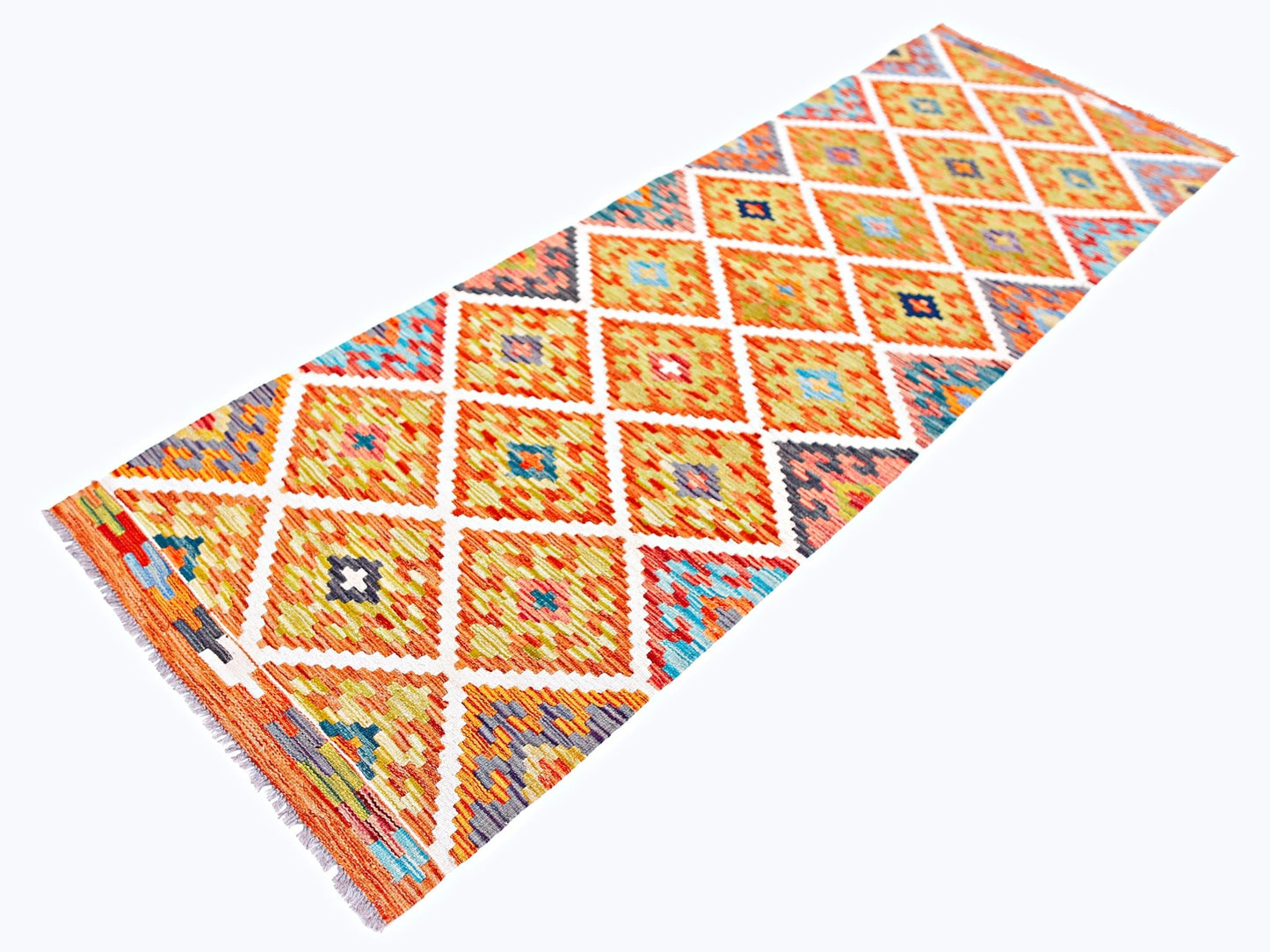 Handwoven Afghan Maimana wool runner rug featuring a vibrant geometric diamond pattern.
