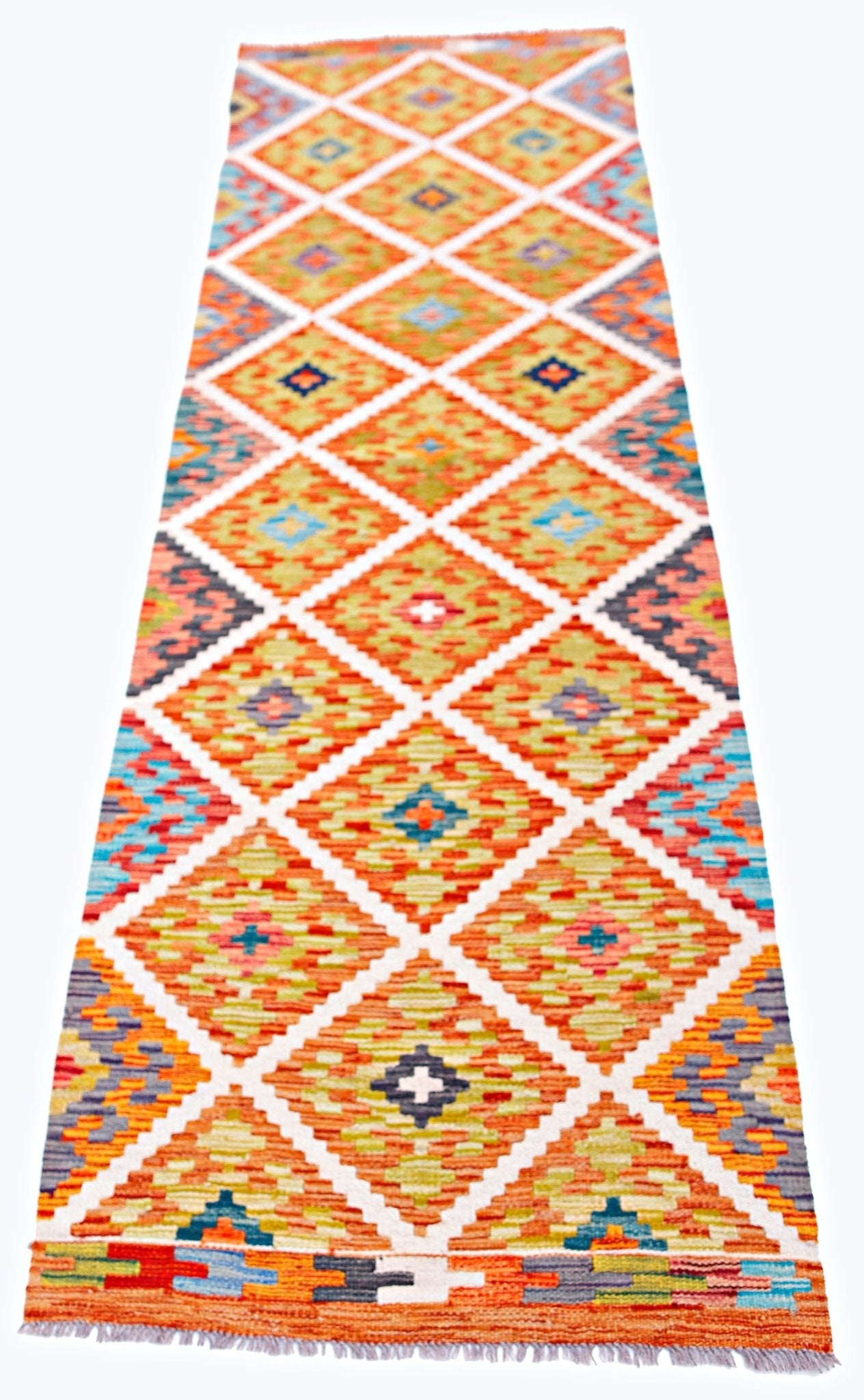 Handwoven Afghan Maimana wool runner featuring a colorful geometric diamond pattern.