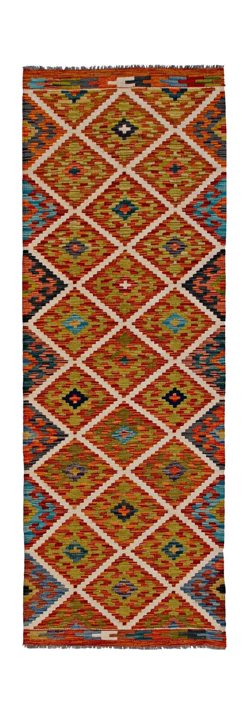 Handwoven Afghan Maimana wool runner rug featuring a colorful geometric diamond pattern.