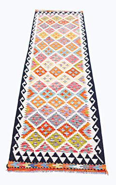 Handwoven Afghan Maimana wool runner featuring a colorful geometric diamond pattern.