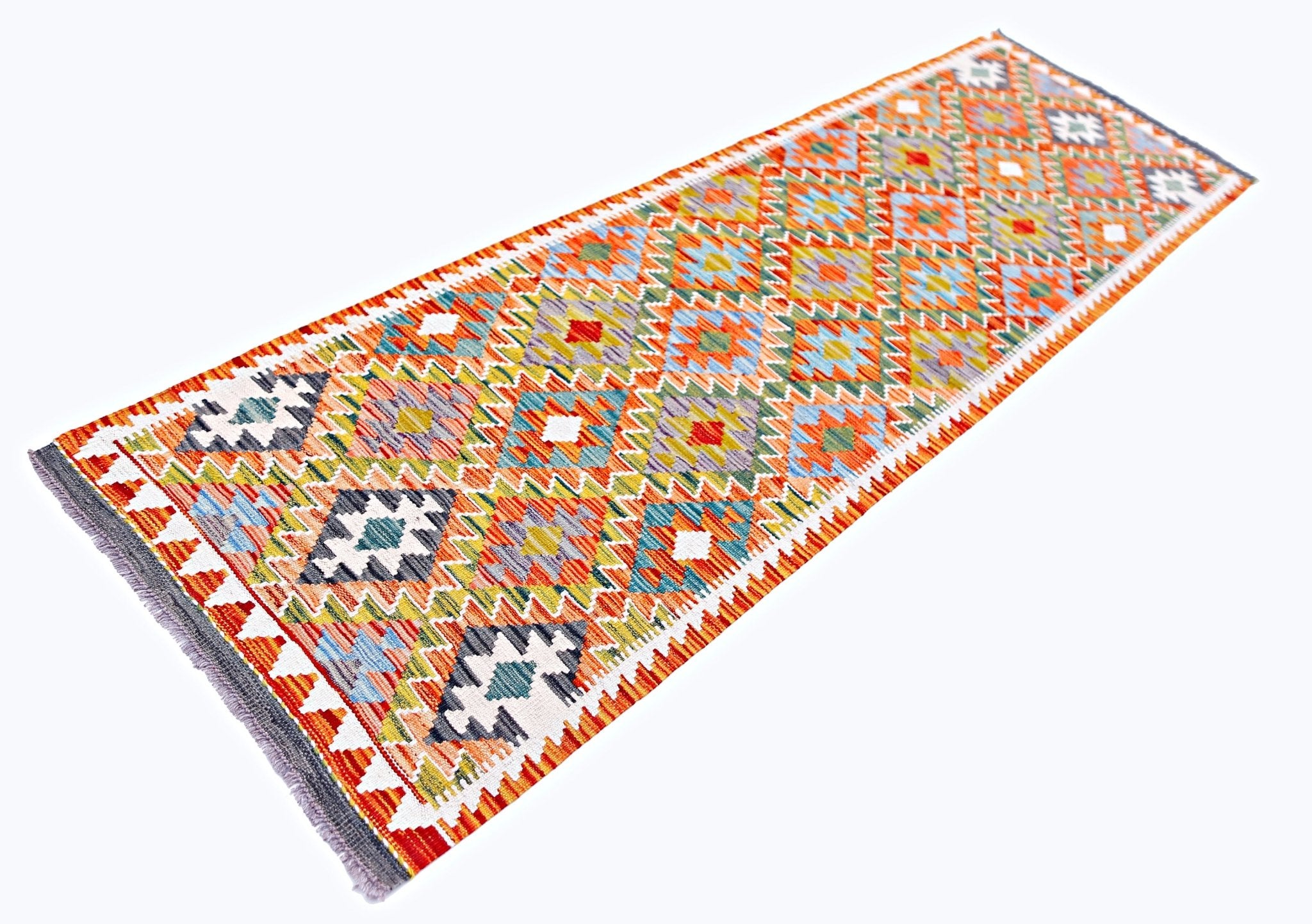 Handwoven Afghan Maimana wool runner rug featuring a vibrant geometric diamond pattern.