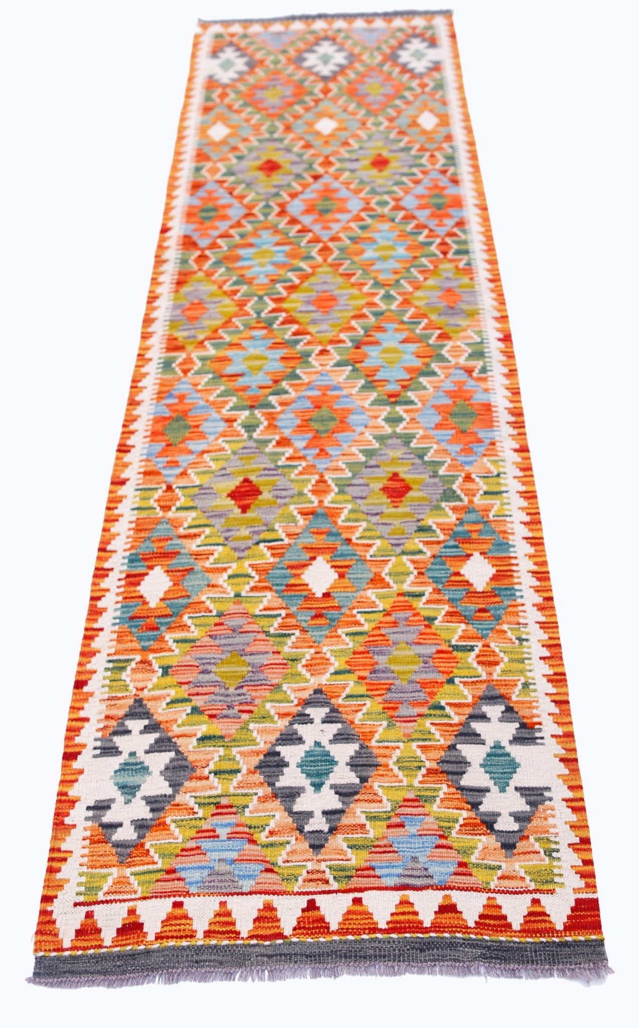 Handwoven Afghan Maimana wool runner featuring a vibrant, multicolored geometric diamond pattern.