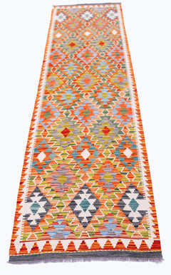Handwoven Afghan Maimana wool runner featuring a vibrant, multicolored geometric diamond pattern.