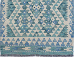 Handwoven Afghan Maimana wool runner featuring a geometric blue and cream diamond pattern.