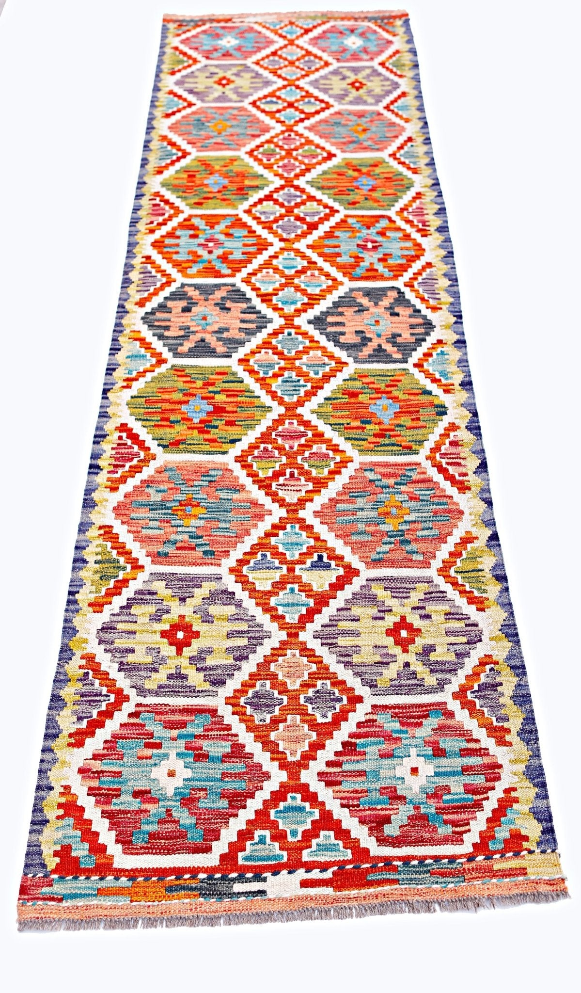 Handwoven Afghan Maimana wool runner featuring a vibrant geometric diamond pattern.