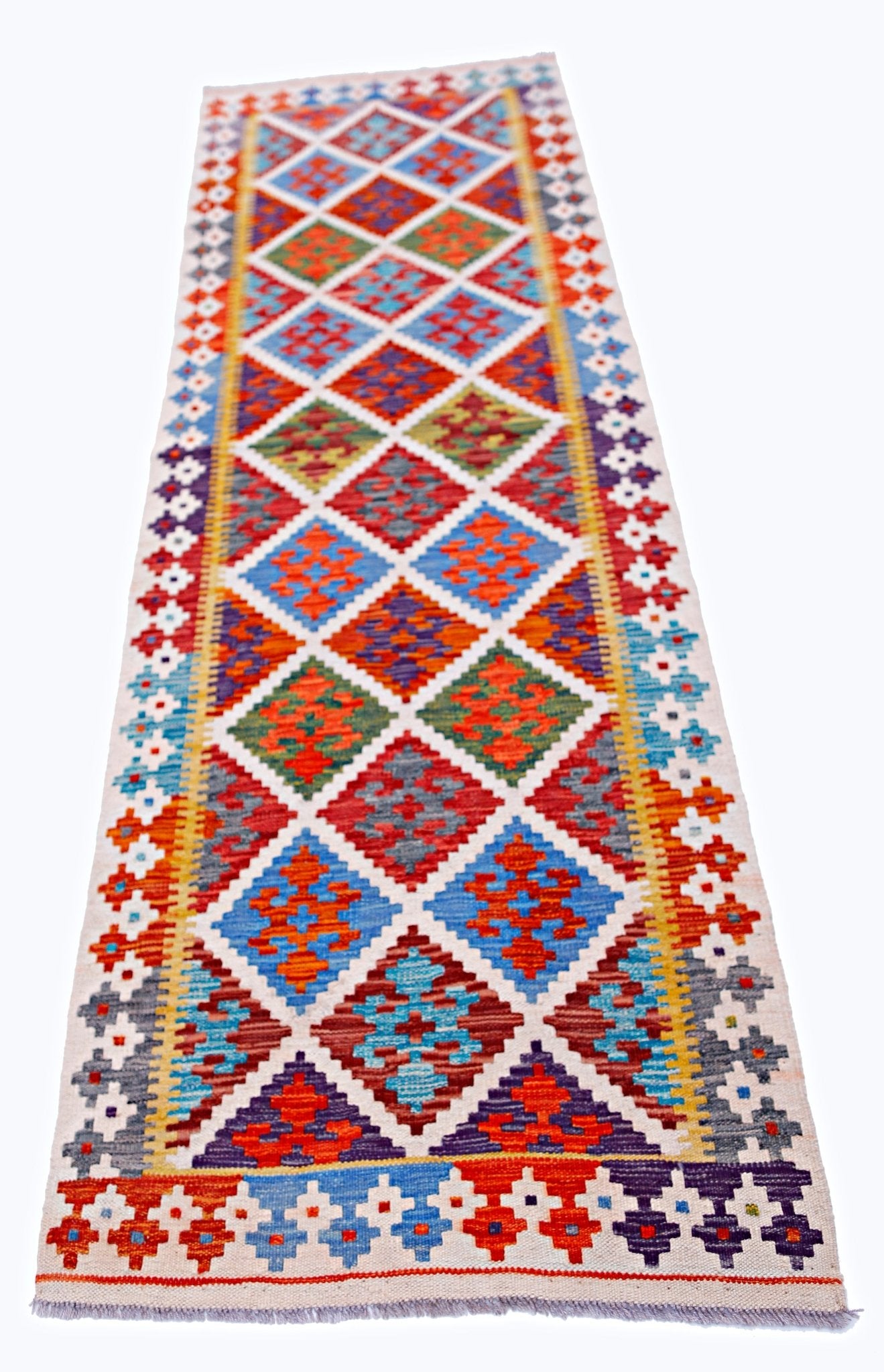 Handwoven Afghan Maimana wool runner featuring a colorful geometric diamond pattern.