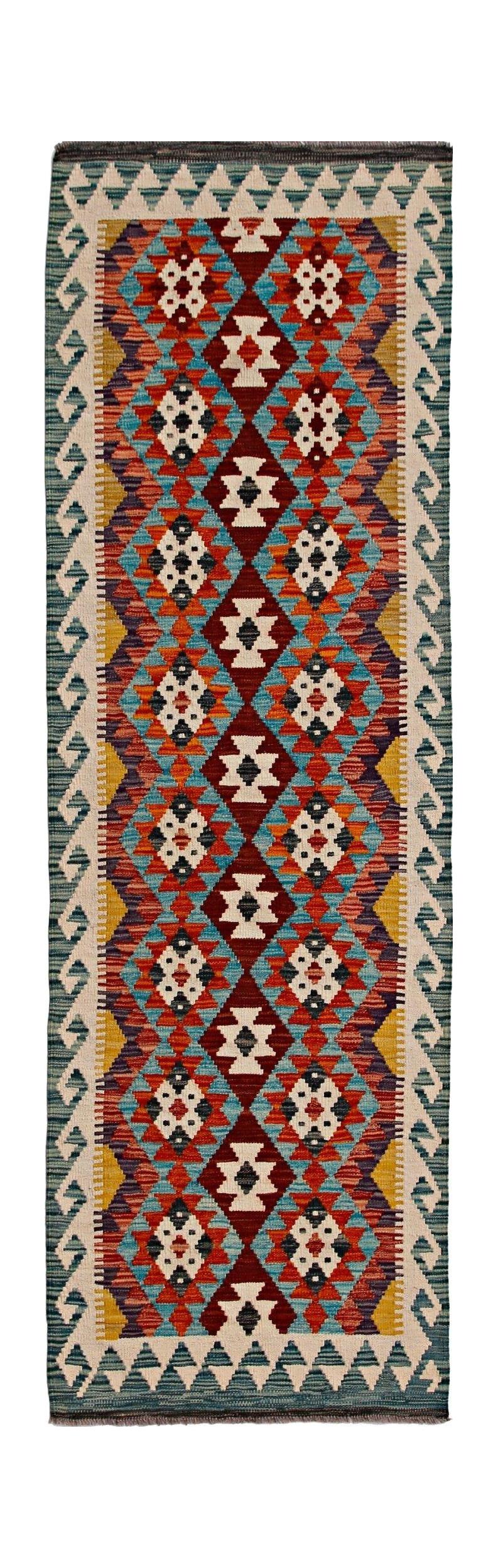 Handwoven Afghan Maimana wool runner rug featuring a colorful geometric diamond pattern.