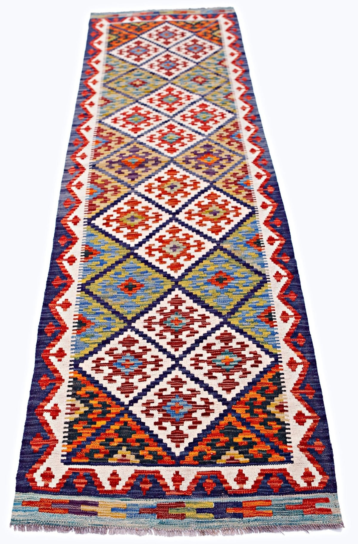 Handwoven Afghan Maimana wool runner featuring a colorful geometric diamond pattern.