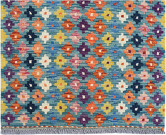Handwoven Afghan Maimana kilim runner featuring a colorful geometric pattern on a blue background.