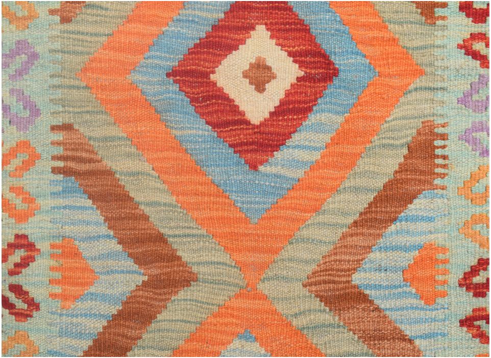 Handmade Afghan Maimana kilim runner featuring a vibrant geometric diamond pattern in wool.