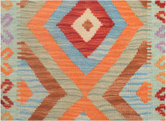 Handmade Afghan Maimana kilim runner featuring a vibrant geometric diamond pattern in wool.