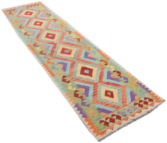 Handmade Afghan Maimana kilim runner featuring a colorful geometric diamond pattern.