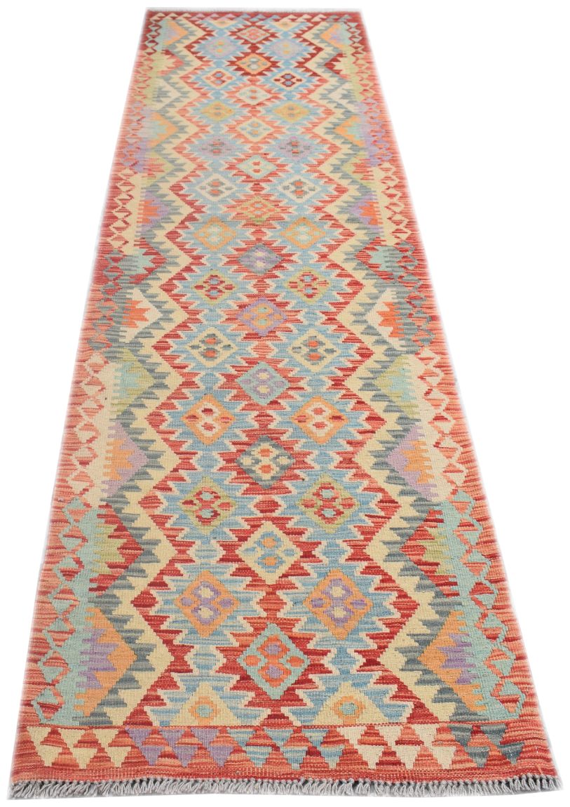 Handmade Afghan Maimana wool runner rug featuring a colorful geometric diamond pattern.