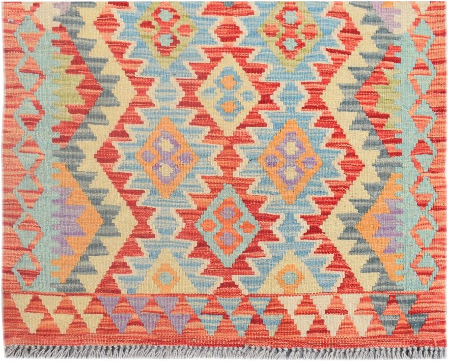Handmade Afghan Maimana kilim runner featuring a vibrant geometric pattern in wool.