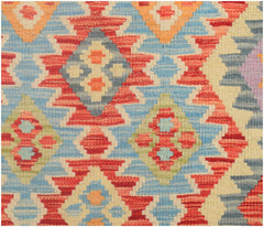 Handmade Afghan Maimana kilim runner featuring a colorful geometric diamond pattern.