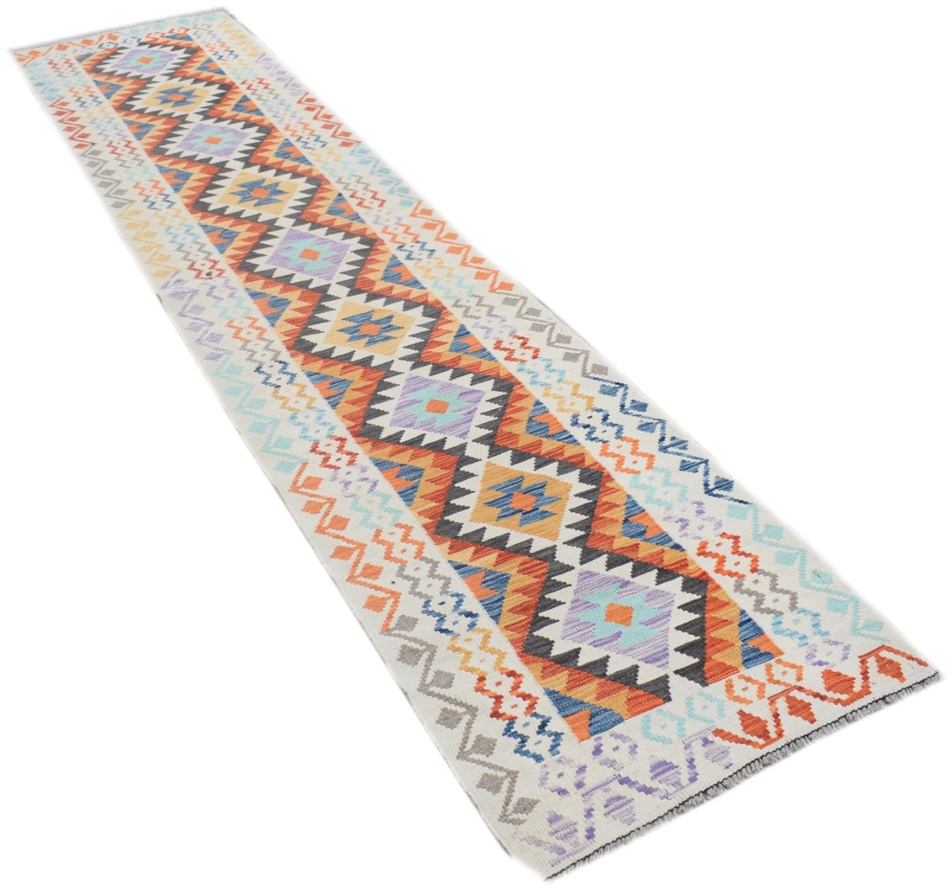 A handmade Afghan Maimana wool runner rug featuring a colorful geometric diamond pattern.