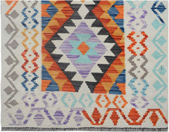 Handmade Afghan Maimana wool runner rug featuring a colorful geometric diamond pattern.