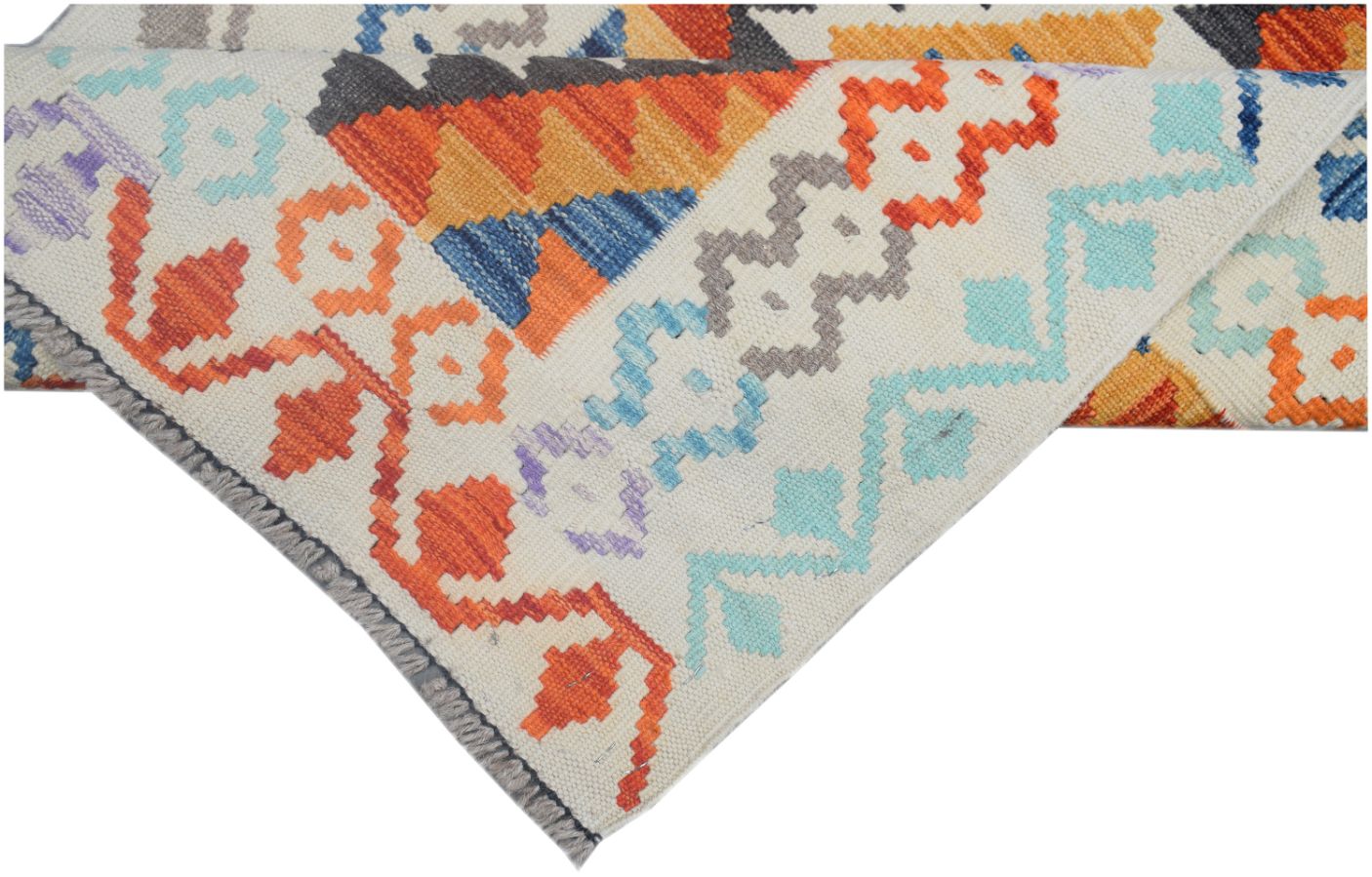 A handmade Afghan Maimana kilim runner featuring vibrant geometric patterns in wool.