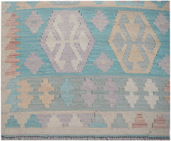 Handmade Afghan Maimana kilim runner featuring geometric patterns in soft pastel tones.