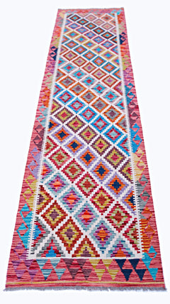 Handwoven Afghan Maimana wool runner featuring a vibrant, multi-colored geometric diamond pattern.