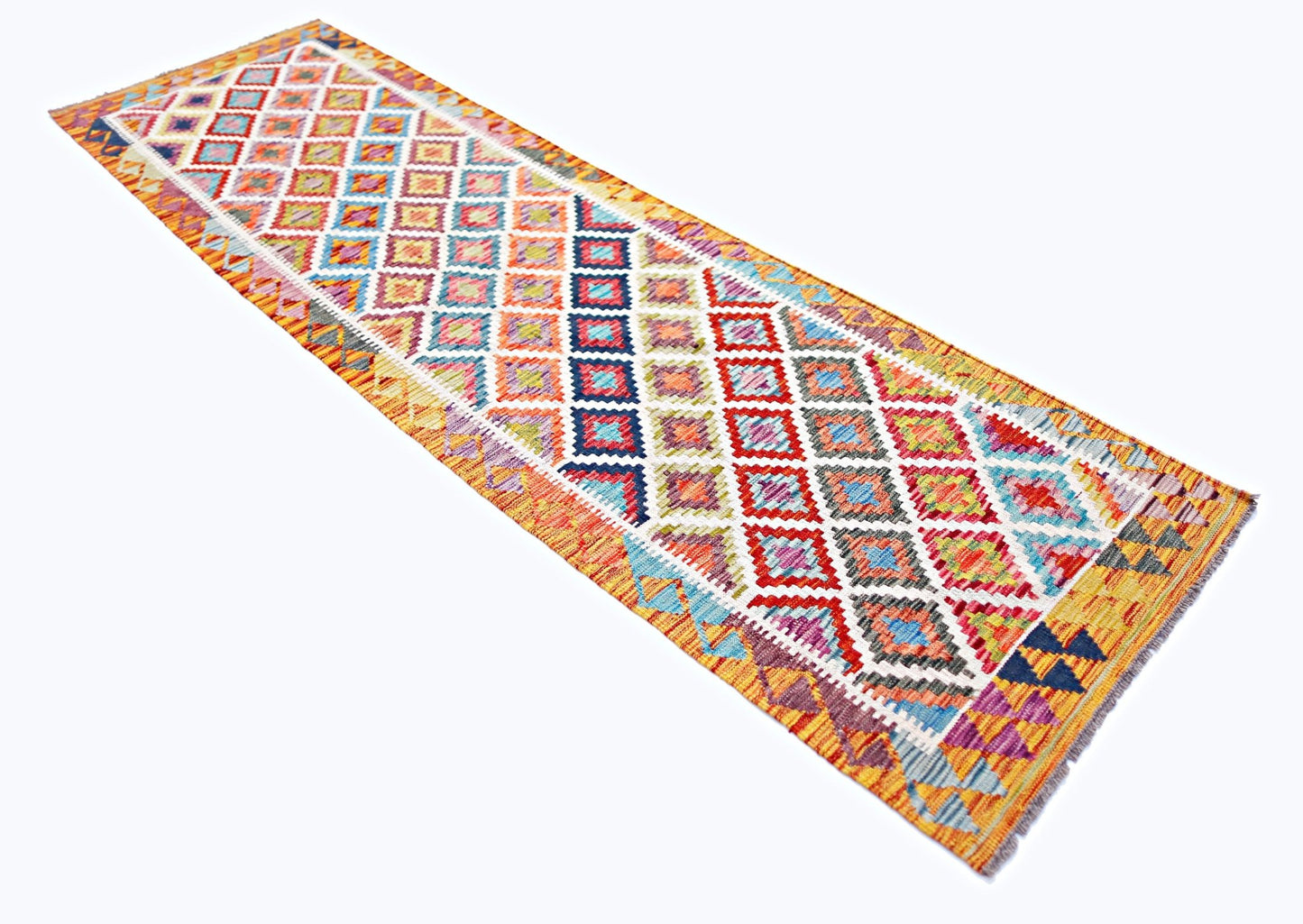 Handwoven Afghan Maimana wool runner rug featuring a colorful geometric diamond pattern.