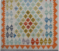 Handwoven Afghan Maimana wool runner rug featuring a geometric pattern in multicolored hues.