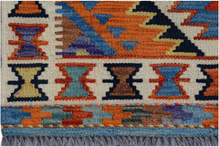 Handwoven Afghan Maimana wool kilim runner featuring colorful geometric patterns and fringe ends.
