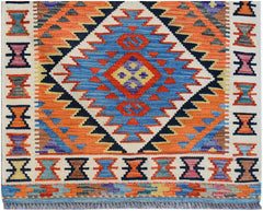 Handwoven Afghan Maimana wool runner featuring a vibrant geometric diamond pattern.