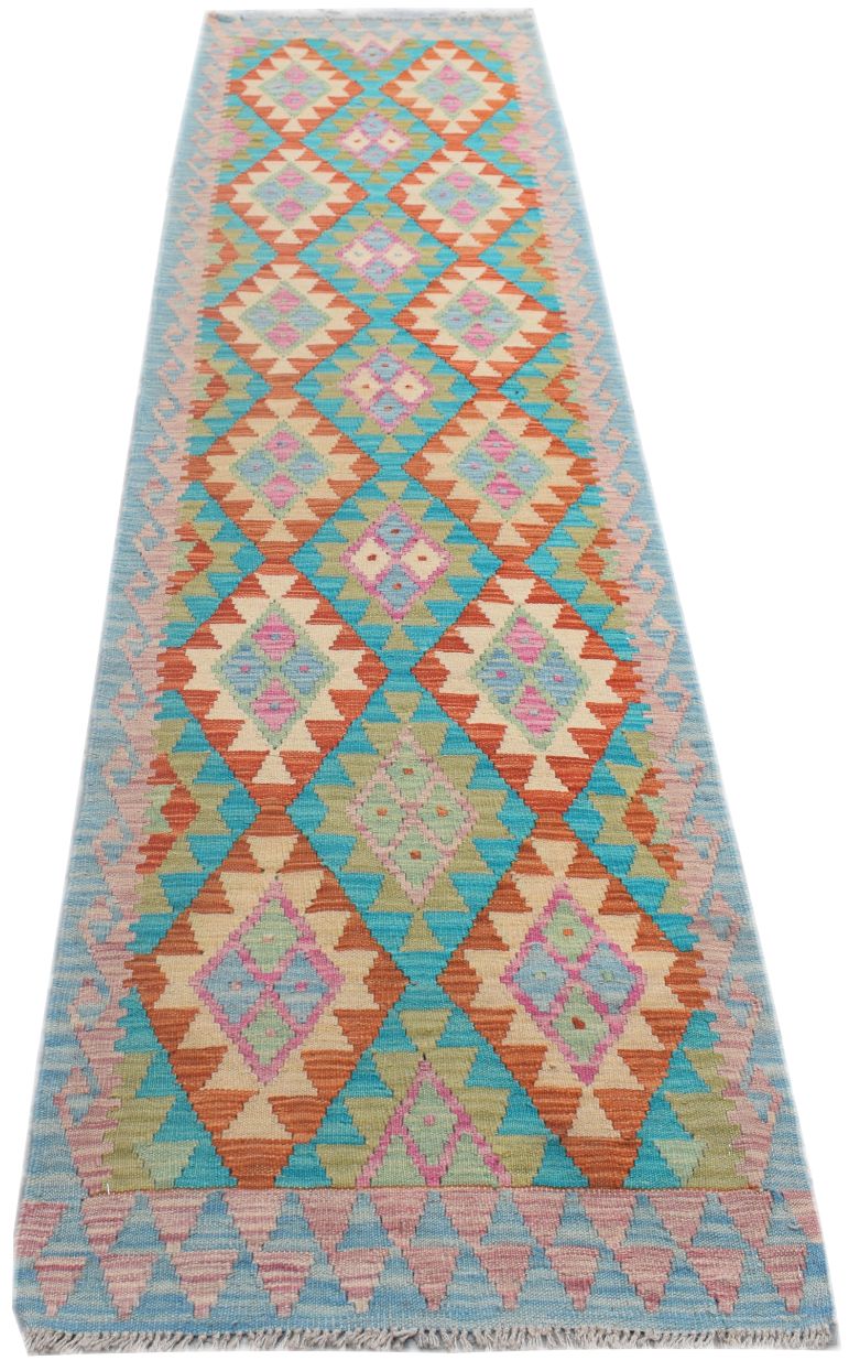 Handmade Afghan Maimana wool runner rug featuring a colorful geometric diamond pattern.
