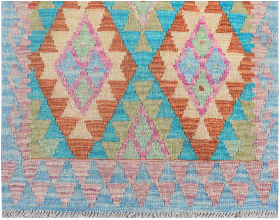 Handmade Afghan Maimana kilim runner featuring a colorful geometric diamond pattern in wool.