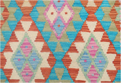 Handmade Afghan Maimana kilim runner featuring a vibrant geometric diamond pattern in wool.
