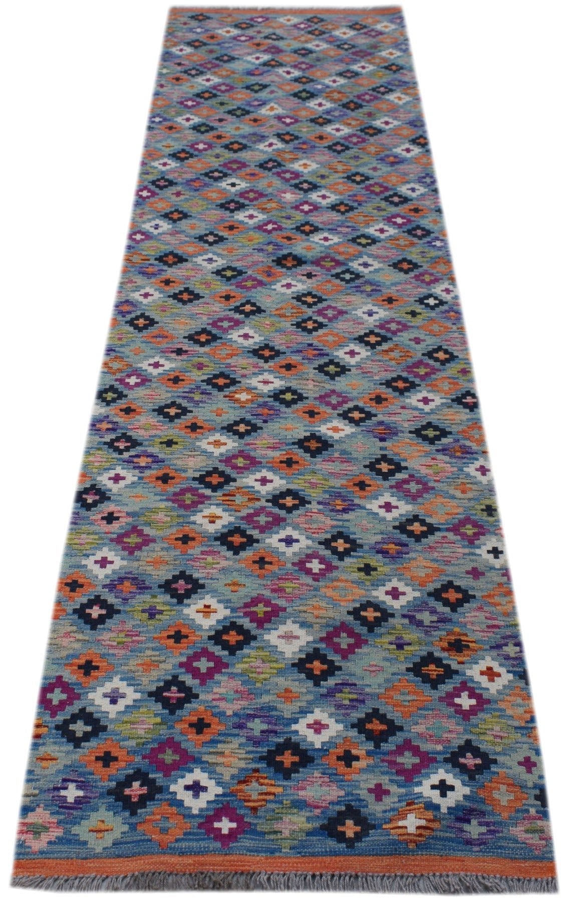 Handwoven Afghan Maimana wool runner featuring a colorful geometric diamond pattern.