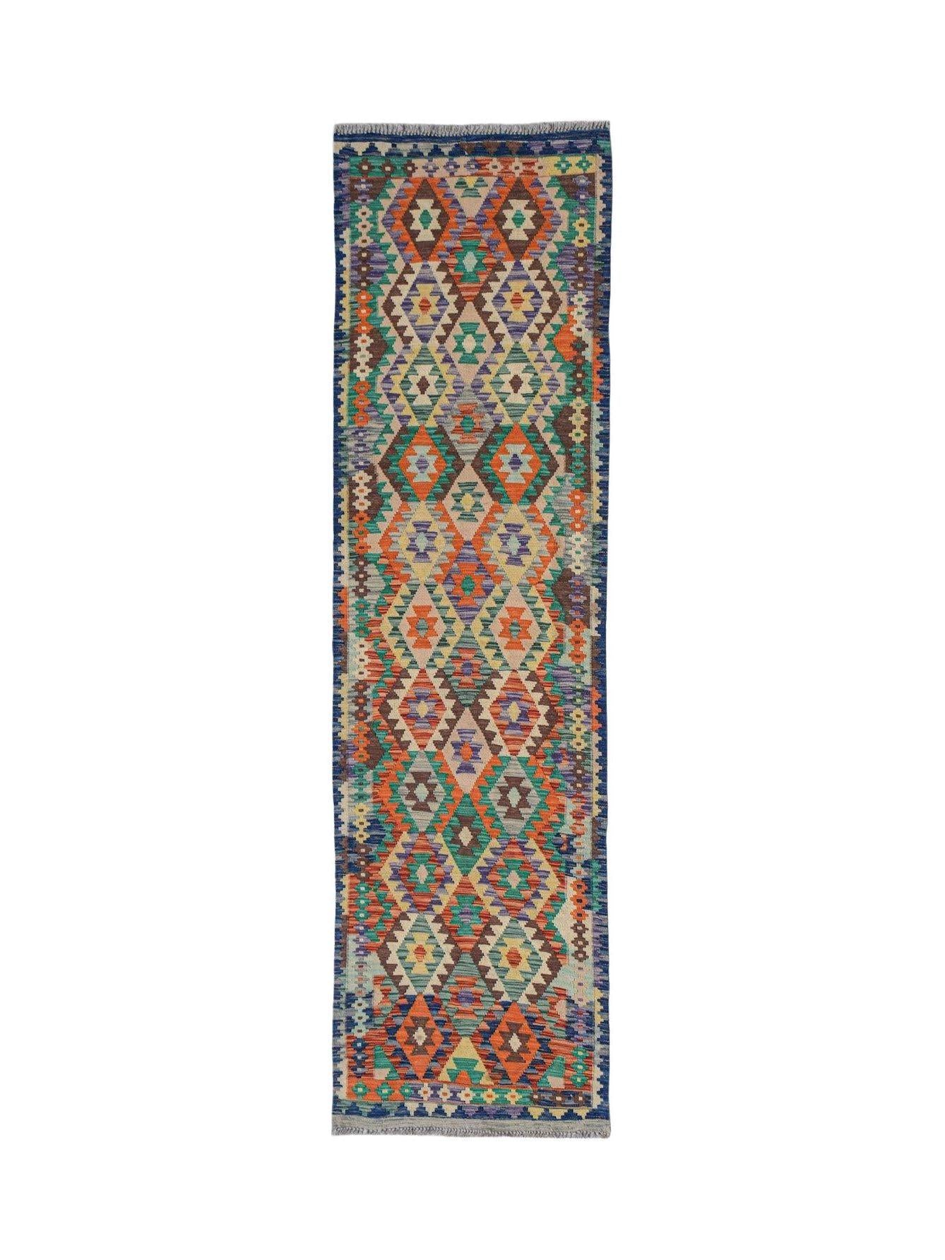 A handmade Afghan Maimana wool runner rug featuring a colorful geometric diamond pattern.