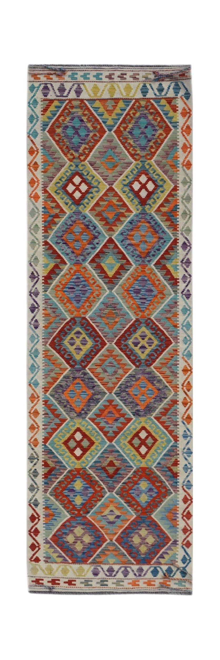 Handwoven Afghan Maimana wool runner featuring a vibrant geometric diamond pattern.