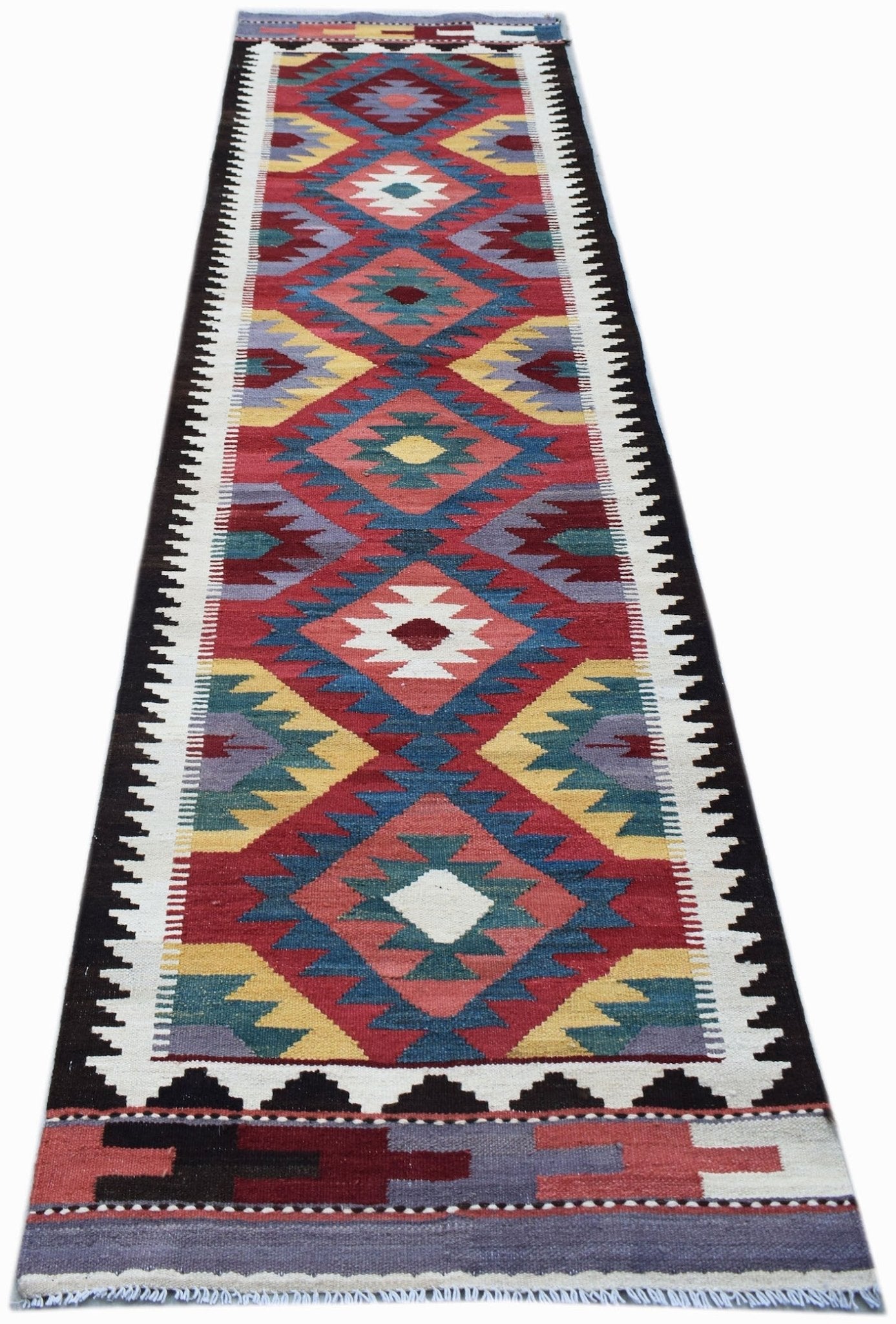 Handwoven Afghan Maimana wool runner featuring a colorful geometric diamond pattern.