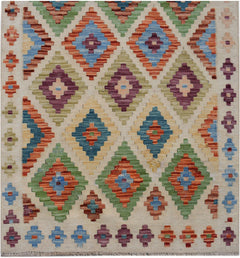Handwoven Afghan Maimana kilim runner featuring a colorful geometric diamond pattern.