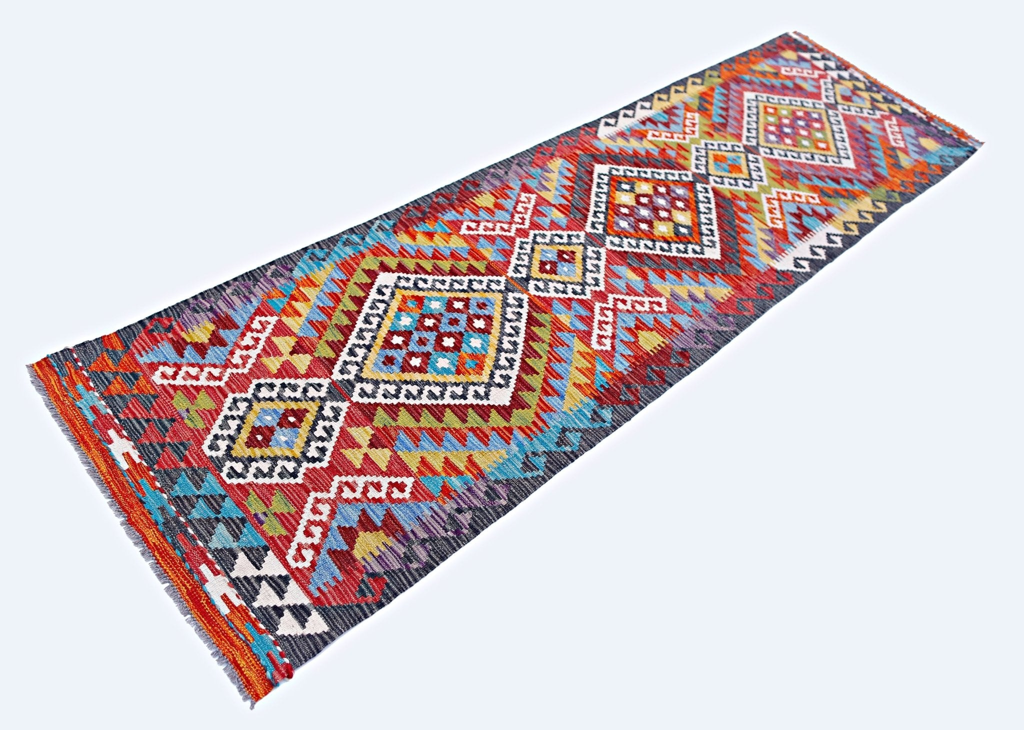 Handwoven Afghan Maimana wool runner rug featuring a vibrant geometric diamond pattern.