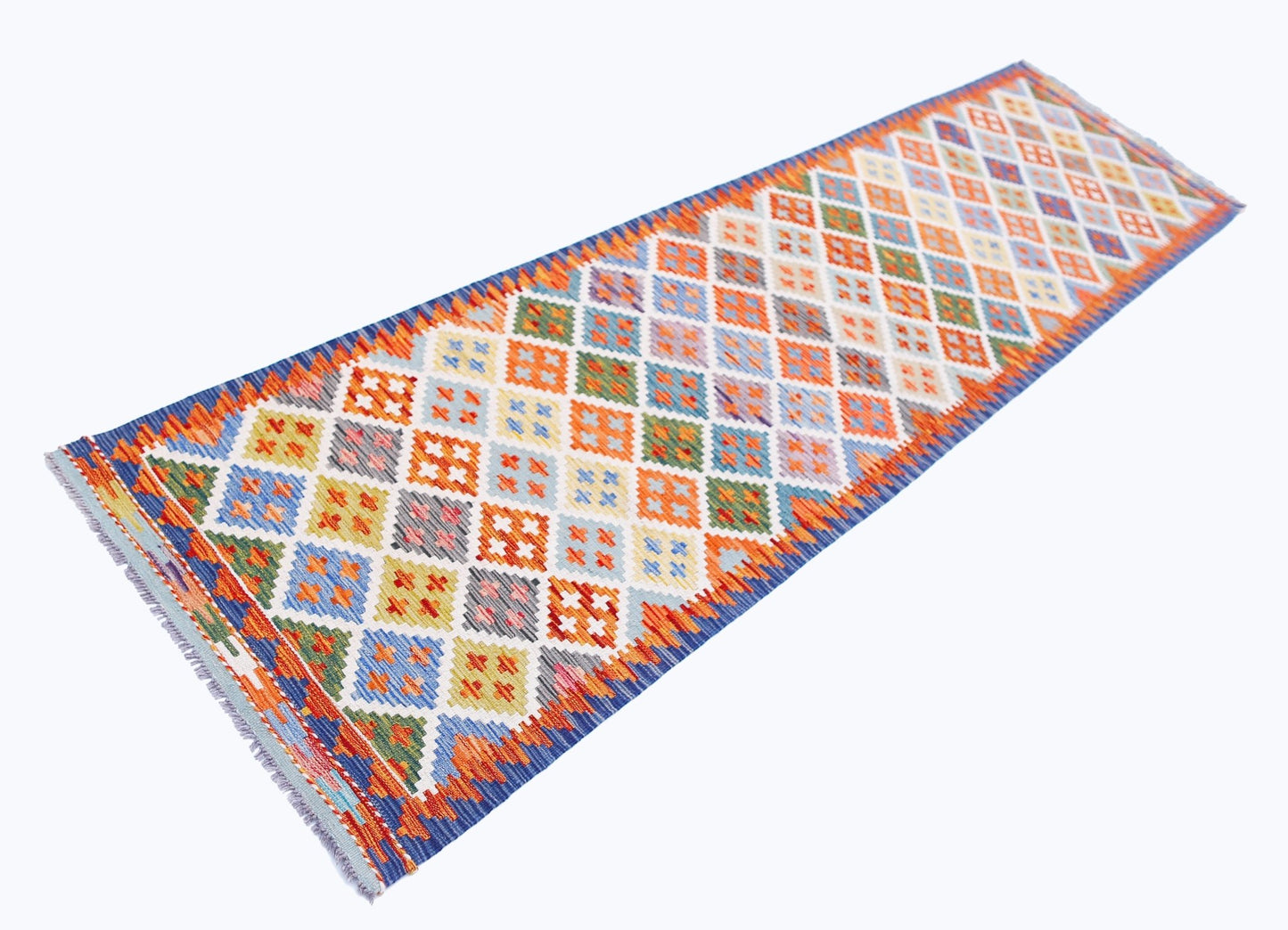 Handwoven Afghan Maimana wool runner rug featuring a colorful geometric diamond pattern.