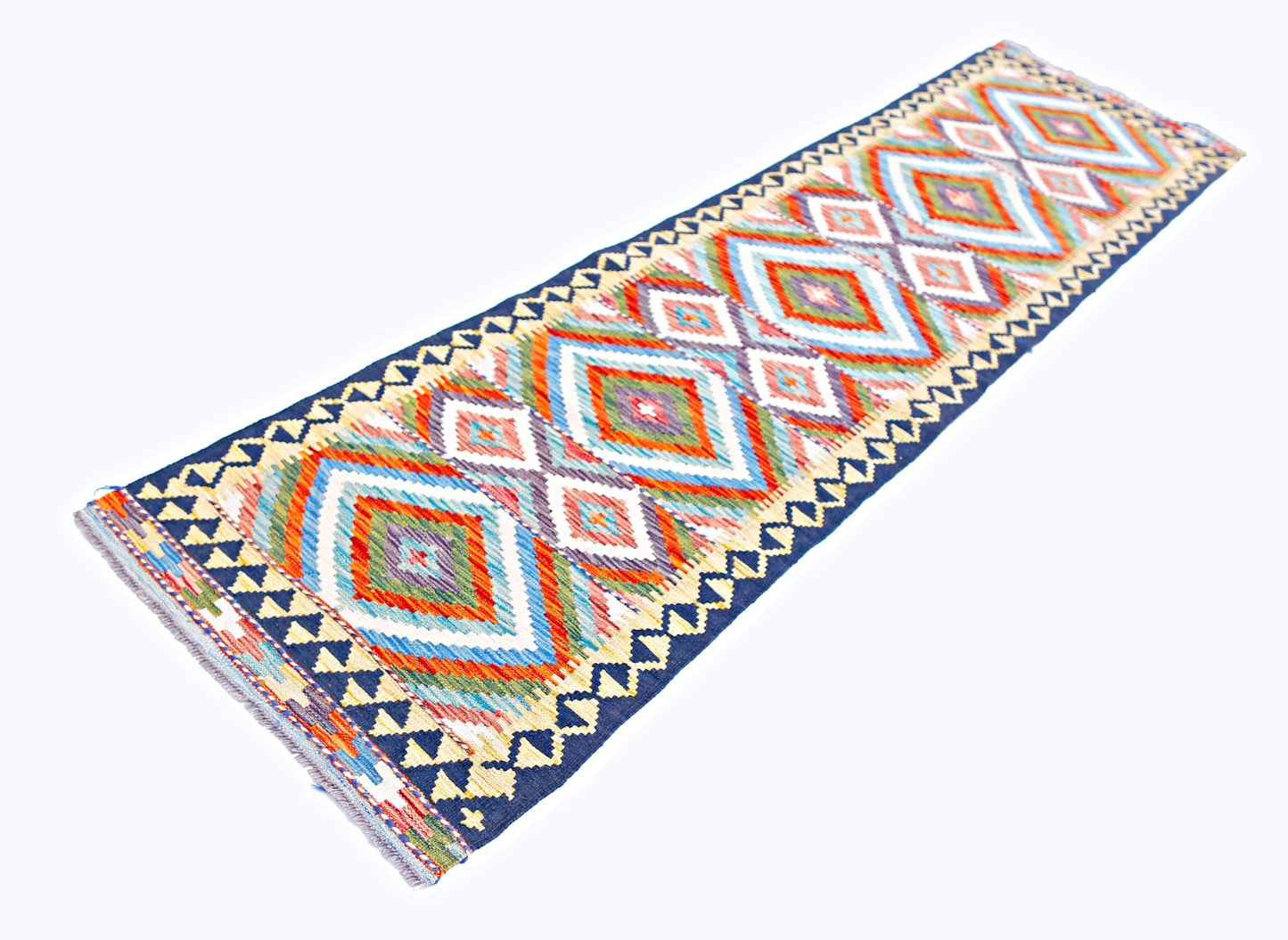 Handwoven Afghan Maimana wool runner featuring a vibrant geometric diamond pattern.