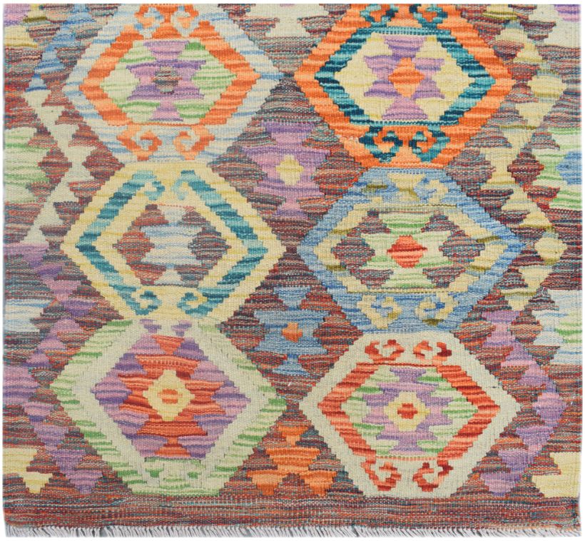 Handmade Afghan Maimana kilim runner featuring a colorful geometric diamond pattern.