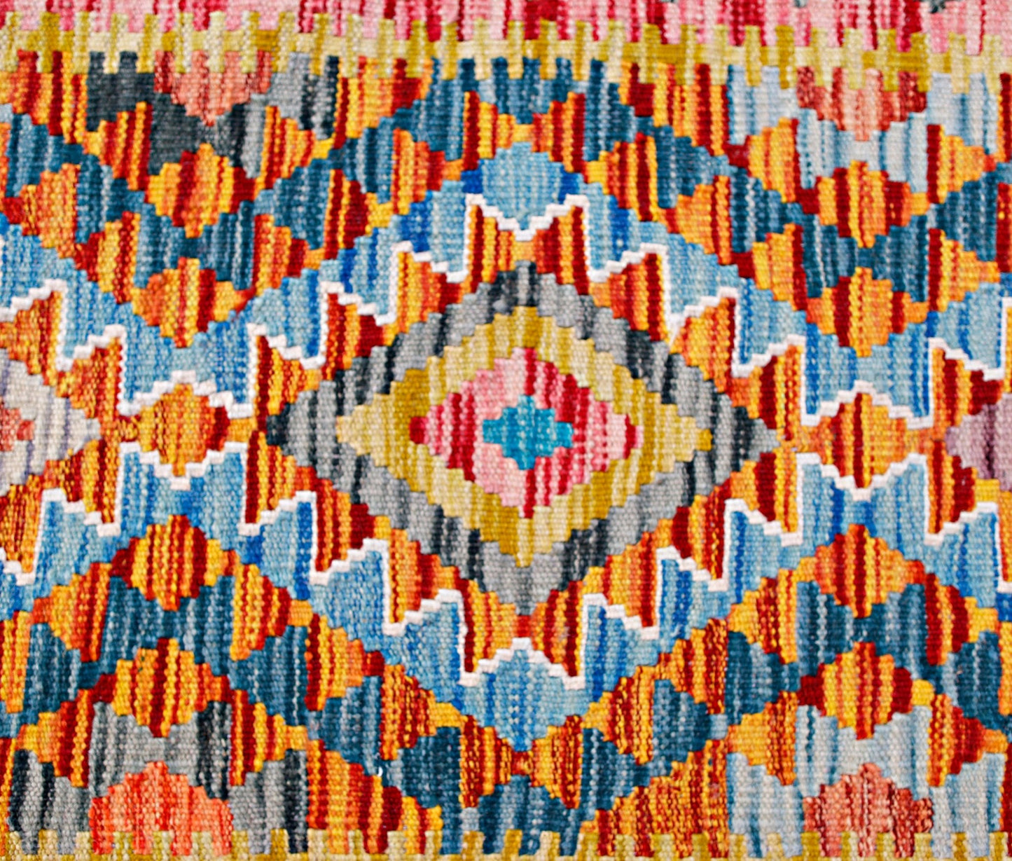 Handwoven Afghan Maimana wool kilim runner featuring a vibrant geometric diamond pattern.
