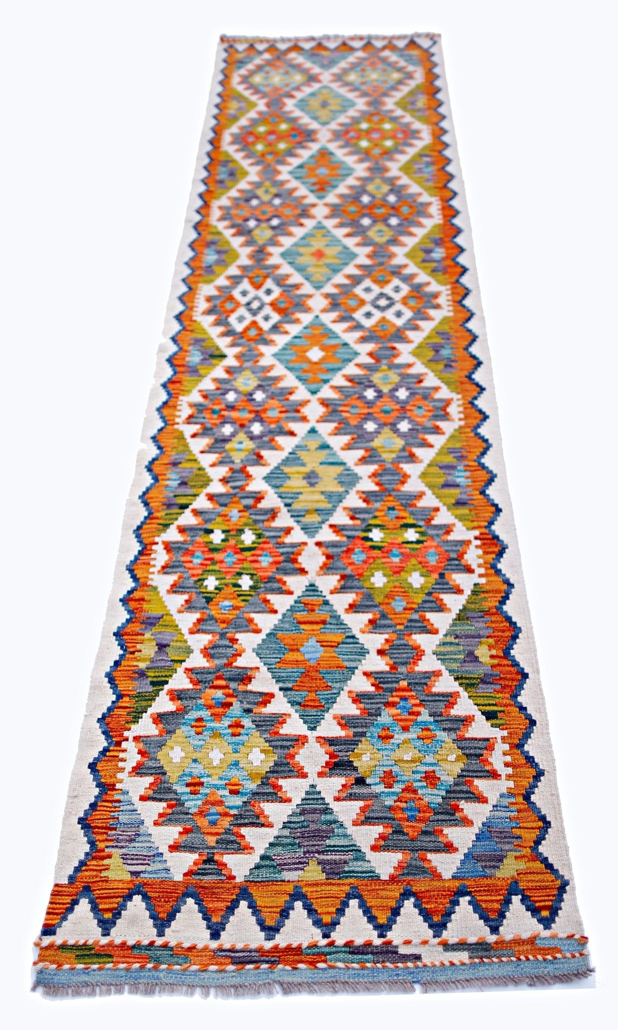 Handwoven Afghan Maimana wool runner featuring a vibrant geometric diamond pattern.