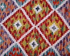 Handwoven Afghan Maimana kilim runner featuring a vibrant geometric diamond pattern in wool.