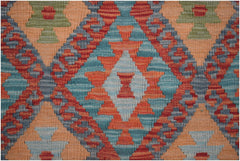 Afghan Maimana Kilim Runner with geometric patterns in orange, blue, and green.