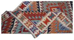 A handwoven Afghan Maimana wool runner featuring a colorful geometric pattern.